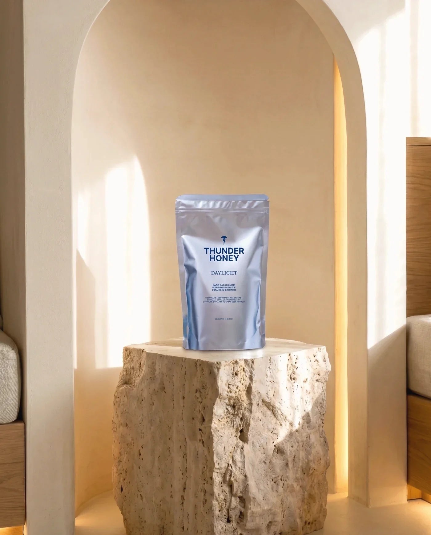 Thunder Honey Daylight pouch on a stone plinth