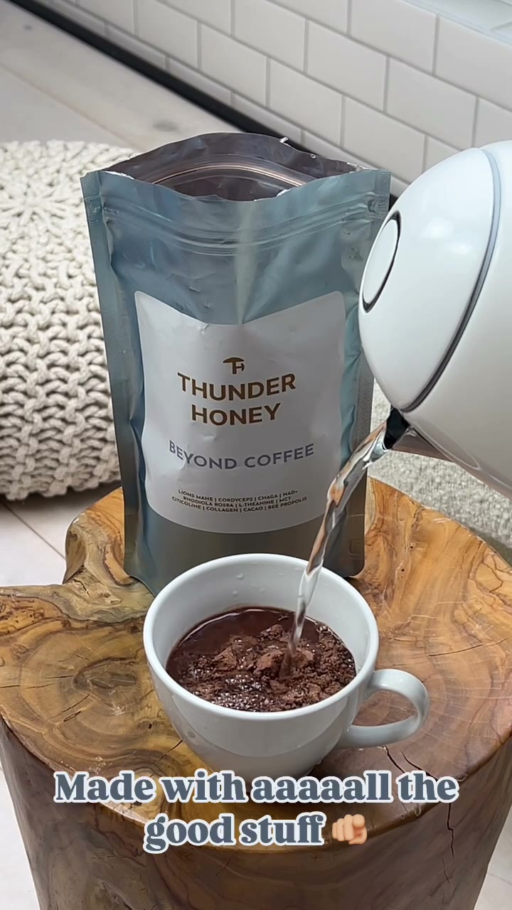 Making a cup of Thunder Honey on a wooden table